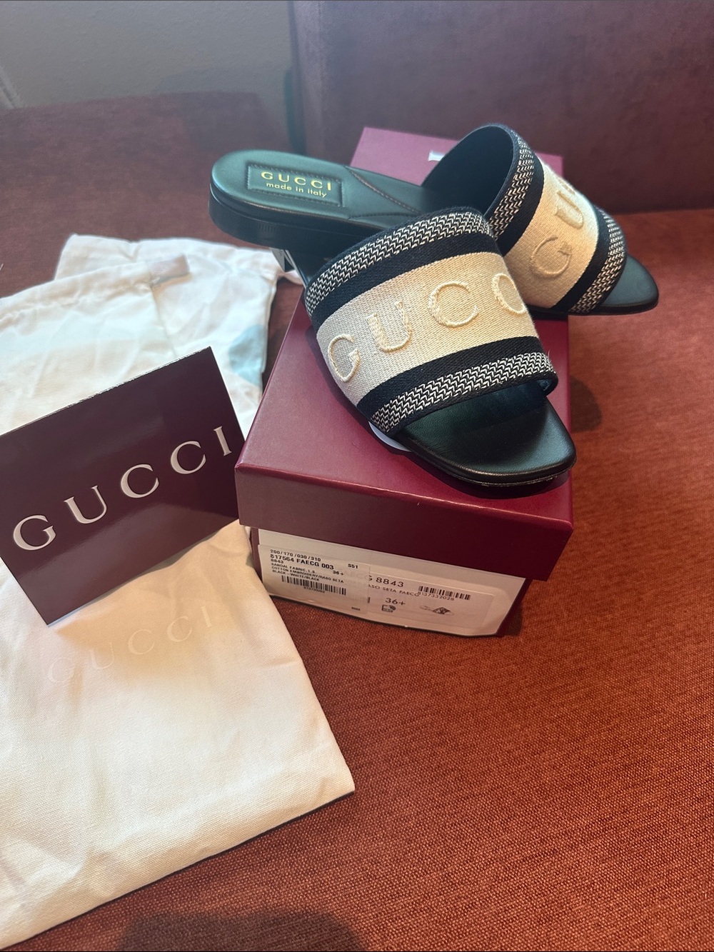 Gucci Beige and Black Embroidered Logo Slide Mules